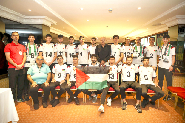 Palestinian team defies odds to keep flag flying high